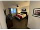 Bright bedroom with a comfortable bed and plenty of natural light at 17256 W West Wind Dr, Surprise, AZ 85387