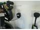 Garage with 50 amp EV charger and water softener at 17256 W West Wind Dr, Surprise, AZ 85387