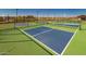 Well-maintained pickleball courts with green and blue surface at 17256 W West Wind Dr, Surprise, AZ 85387