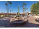 Community courtyard with brick planters and cacti at 17404 N 99Th Ave # 205, Sun City, AZ 85373