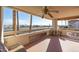 Spacious patio with seating area and city views at 17404 N 99Th Ave # 205, Sun City, AZ 85373