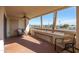 Private patio with seating area and city views at 17404 N 99Th Ave # 205, Sun City, AZ 85373