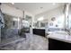 Elegant bathroom with double vanity and large walk-in shower at 18370 W Goldenrod St, Goodyear, AZ 85338