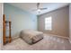 Bedroom with ceiling fan and gray carpet at 18370 W Goldenrod St, Goodyear, AZ 85338