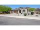 Charming craftsman style home with a landscaped yard at 18370 W Goldenrod St, Goodyear, AZ 85338