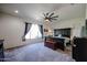 Large main bedroom with ceiling fan and plenty of natural light at 18370 W Goldenrod St, Goodyear, AZ 85338