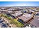 Aerial view of house, pool, and surrounding neighborhood at 18904 W Mercer Ln, Surprise, AZ 85388