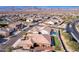 Aerial view of house with pool and neighborhood at 18904 W Mercer Ln, Surprise, AZ 85388