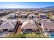 Aerial view of house with pool and mountain views at 18904 W Mercer Ln, Surprise, AZ 85388