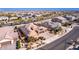 Aerial view of house showcasing a two-car garage and neighborhood at 18904 W Mercer Ln, Surprise, AZ 85388