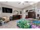 Spacious bedroom with dresser and large TV at 18904 W Mercer Ln, Surprise, AZ 85388