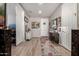 Bright and spacious entryway with tile flooring and decorative accents at 18904 W Mercer Ln, Surprise, AZ 85388