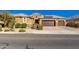 Beautiful single-story home with solar panels and a two-car garage at 18904 W Mercer Ln, Surprise, AZ 85388