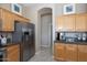 Kitchen with stainless steel appliances and ample cabinet space at 1942 W Peninsula Cir, Chandler, AZ 85248