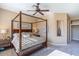 Bright main bedroom featuring a comfortable bed and ceiling fan at 1942 W Peninsula Cir, Chandler, AZ 85248