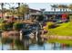 Landscaped water feature and clubhouse view at 1942 W Peninsula Cir, Chandler, AZ 85248