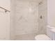 Updated bathroom with marble shower and hexagon floor tiles at 200 E Southern Ave # 175, Tempe, AZ 85282