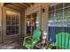 Cozy patio with two green chairs and small table at 200 E Southern Ave # 175, Tempe, AZ 85282