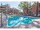 Community pool with surrounding lounge chairs at 200 E Southern Ave # 175, Tempe, AZ 85282