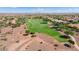 Aerial view of golf course and surrounding community at 20515 N 264Th Ave, Buckeye, AZ 85396