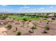 Aerial view of golf course and community landscape at 20515 N 264Th Ave, Buckeye, AZ 85396