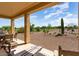 Patio with seating area and golf course view at 20515 N 264Th Ave, Buckeye, AZ 85396