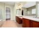 Double vanity bathroom with large mirror and walk-in shower at 20515 N 264Th Ave, Buckeye, AZ 85396