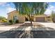 Single-story house with a two-car garage and desert landscaping at 20515 N 264Th Ave, Buckeye, AZ 85396