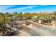 Gated community entrance with well-maintained landscaping at 21320 N 56Th St # 2001, Phoenix, AZ 85054