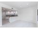 View of kitchen with white cabinets and granite countertops at 21320 N 56Th St # 2001, Phoenix, AZ 85054