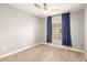 Bedroom with carpet, ceiling fan and blue curtains at 2150 W Alameda Rd # 1112, Phoenix, AZ 85085