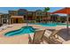 Community pool and spa area with comfortable lounge chairs at 2150 W Alameda Rd # 1112, Phoenix, AZ 85085