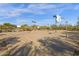 Full-size outdoor basketball court with multiple hoops at 21893 N 78Th St, Scottsdale, AZ 85255