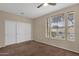 Bedroom with double door closet and window blinds at 21893 N 78Th St, Scottsdale, AZ 85255