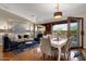 Bright dining area with large windows and a view of the pool at 21893 N 78Th St, Scottsdale, AZ 85255