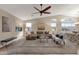 Spacious living room with vaulted ceiling, neutral decor, and ceiling fan at 21893 N 78Th St, Scottsdale, AZ 85255