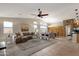 Large living room with sectional sofa and stone accent wall at 21893 N 78Th St, Scottsdale, AZ 85255