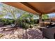 Outdoor patio with seating, grill, and putting green at 21893 N 78Th St, Scottsdale, AZ 85255