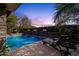 Relaxing pool area with lounge chairs and fire pit at 21893 N 78Th St, Scottsdale, AZ 85255