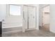 Spa-like bathroom with a soaking tub, glass shower, and a bright window for a relaxing atmosphere at 21916 W Duane Ln, Wittmann, AZ 85361
