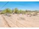 Large desert landscape homesite showing the scale of the surrounding desert terrain at 21916 W Duane Ln, Wittmann, AZ 85361