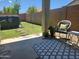 Inviting backyard featuring patio, green grass, above-ground pool, and decorative outdoor rug at 2441 W Beverly Rd, Phoenix, AZ 85041