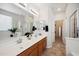 Double vanity bathroom with soaking tub and walk-in shower at 2441 W Beverly Rd, Phoenix, AZ 85041