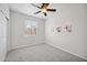 Bright bedroom with ceiling fan and neutral decor at 2441 W Beverly Rd, Phoenix, AZ 85041