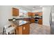 Modern kitchen with stainless steel appliances and granite countertops at 2441 W Beverly Rd, Phoenix, AZ 85041