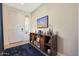 Bright entryway with a console table and rug at 24454 N 173Rd Ln, Surprise, AZ 85387