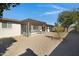 Spacious backyard with gravel and trees at 2543 E Manhatton Dr, Tempe, AZ 85282