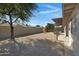 Backyard with gravel and wood gate at 2543 E Manhatton Dr, Tempe, AZ 85282