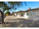 Large backyard with gravel and trees at 2543 E Manhatton Dr, Tempe, AZ 85282