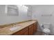 Updated bathroom with double sinks and granite vanity at 2543 E Manhatton Dr, Tempe, AZ 85282